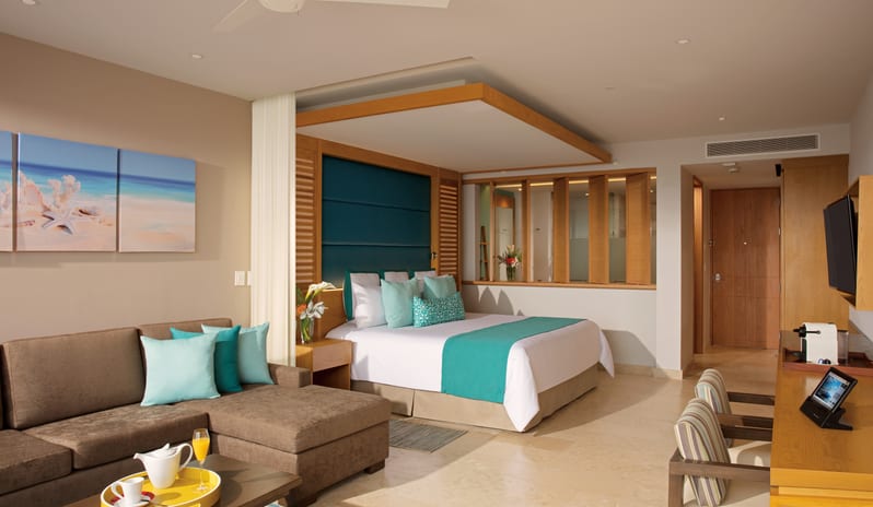 DREAMS PLAYA MUJERES JUNIOR SUITE POOL VIEW BEDROOM